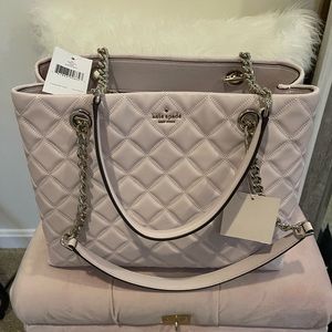 Kate spade bag brand new never used. From Kate spade store.